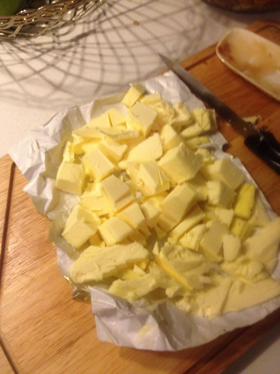 Dice or shred cold butter into small pieces.