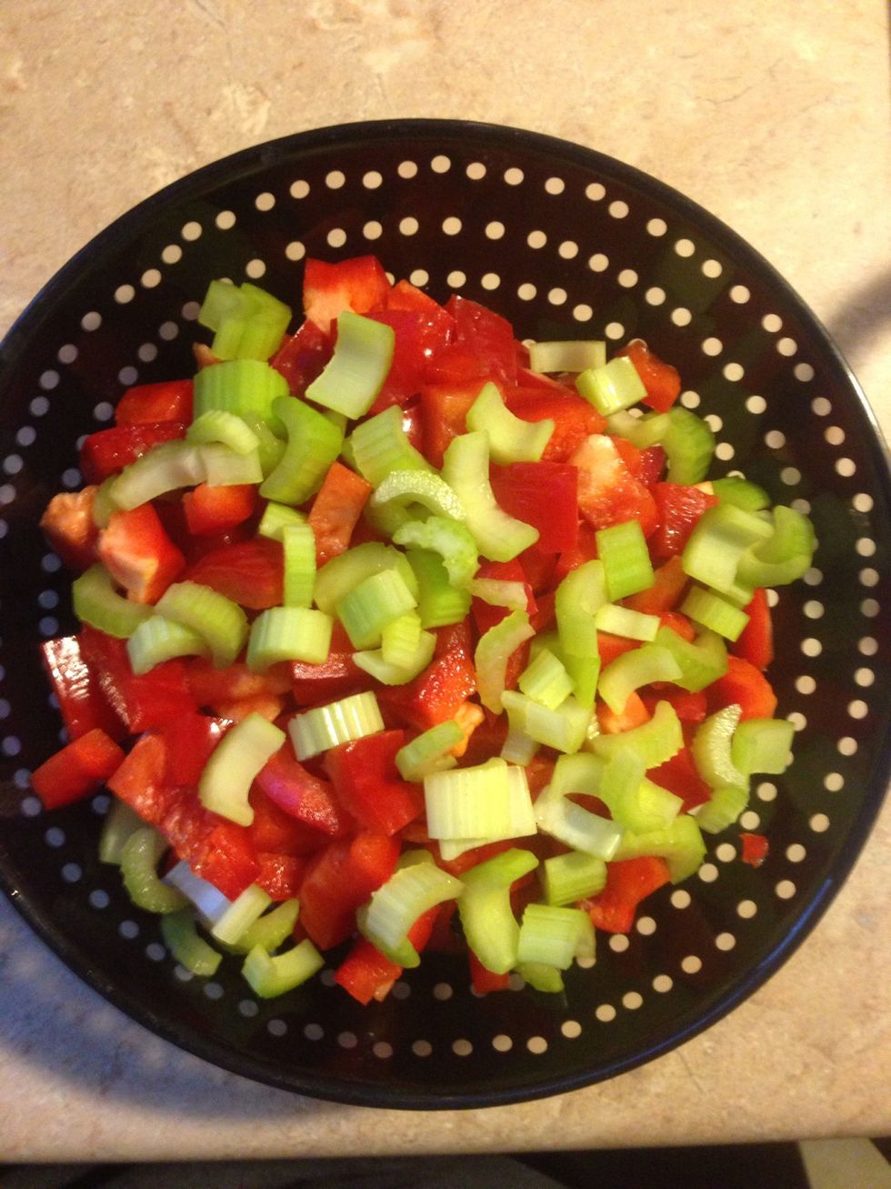 Dice peppers, celery