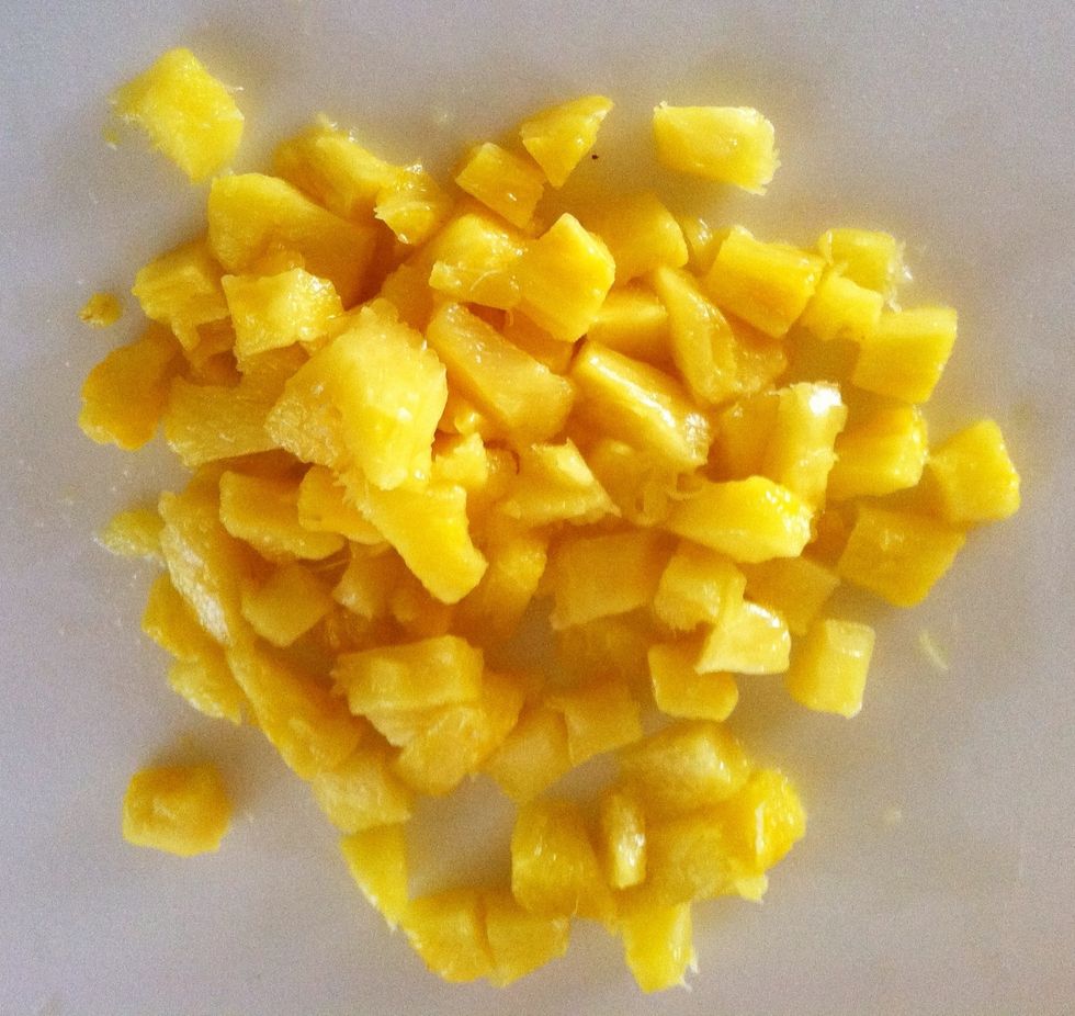 Dice some pineapple - fresh or canned.