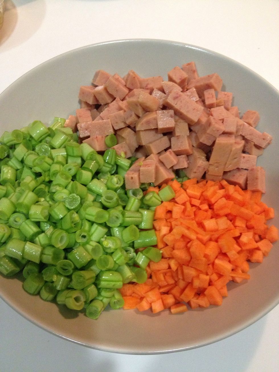Dice the carrot, French bean and luncheon meat.