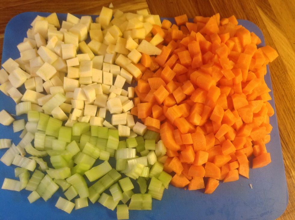 Dice the carrots, celery, parsnip, sweede and turnip. You can dice them bigger for a more chunky soup.