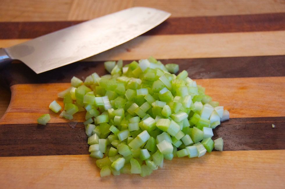 Dice the celery about the same size as the peas...