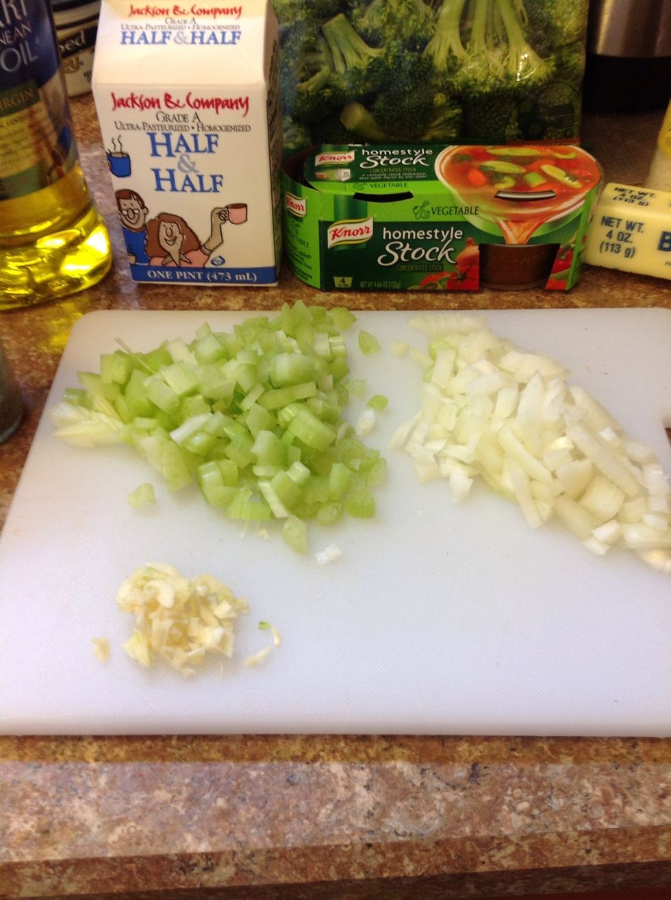 Dice the celery, onion and mince the garlic on chopping board