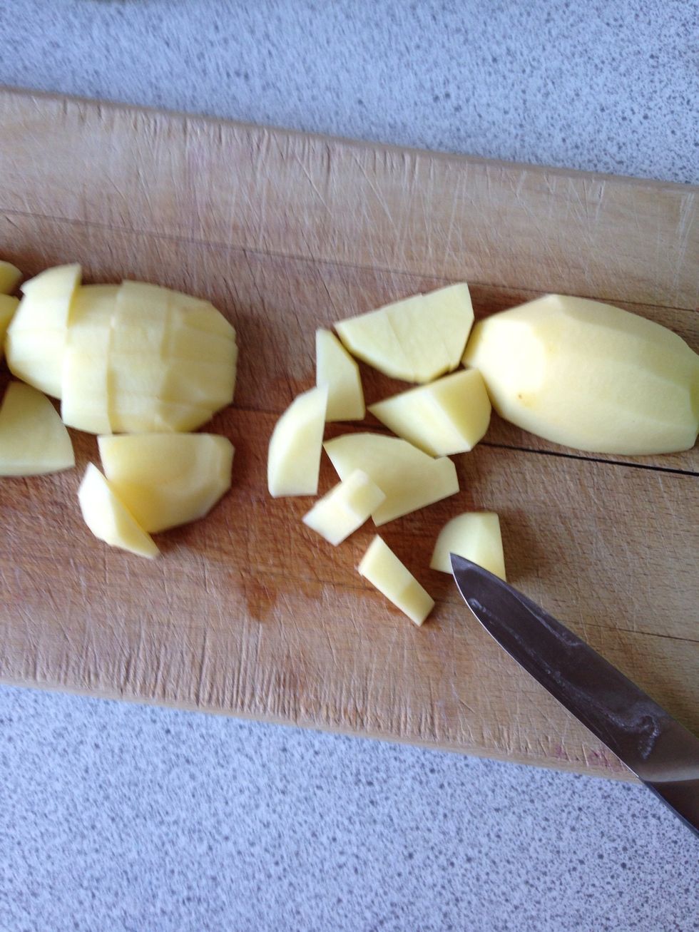Dice the potatoes and put them in a bowl.