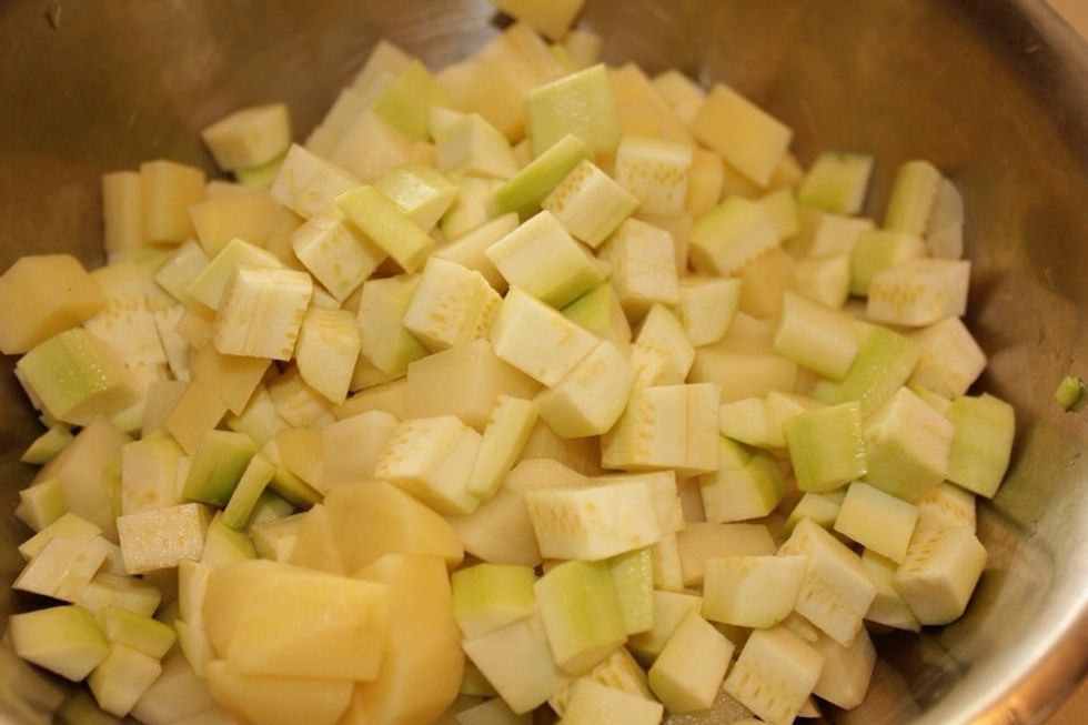 Dice the potatoes and zucchini