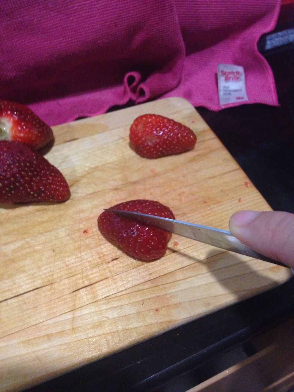 Dice the strawberries the same way you would to an onion. Vertical, horizontal then across