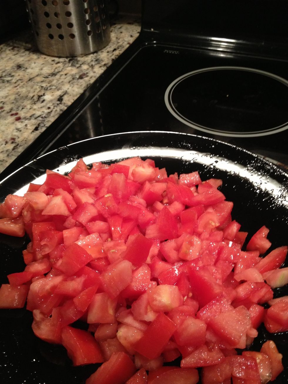 Dice the tomato and add to a medium mixing bowl. Personally I like to de-seed the tomato so that it is more of a chunky salsa rather than a mush.