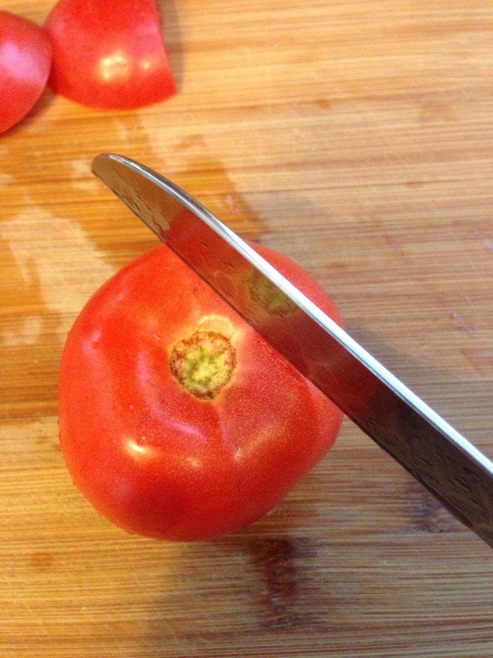 Dice the tomatoes. I like to cut them off as shown.