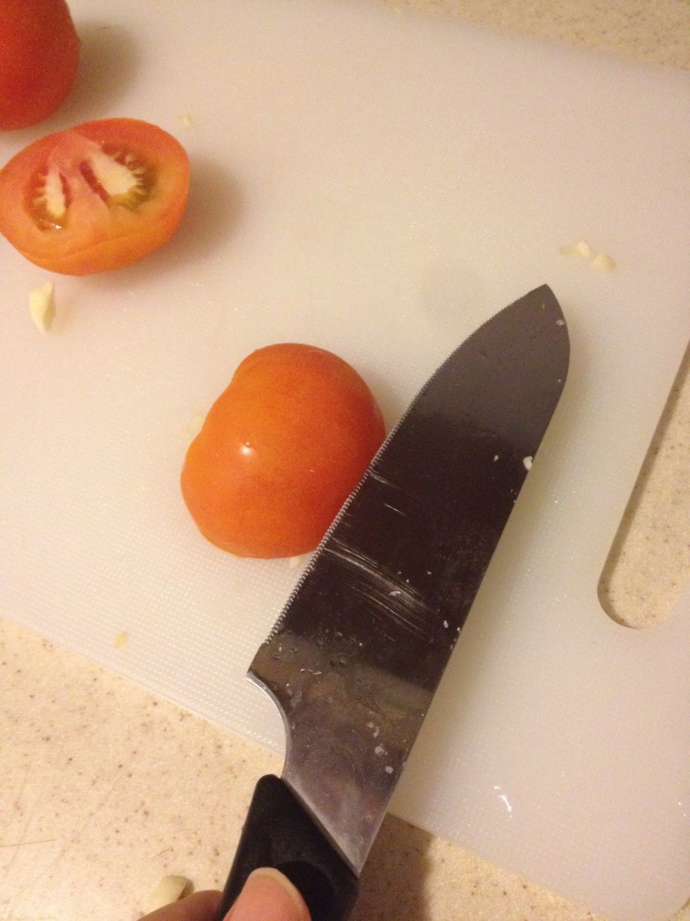 Dice tomatoes by cut to halves, cut horizontally (not all the way tho)