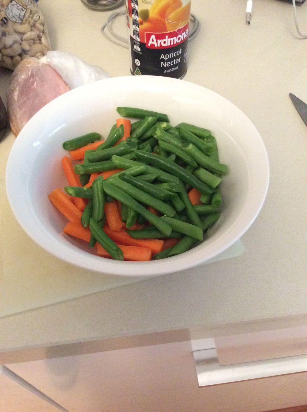 Dice vegetables, place them in wok and let them fry.