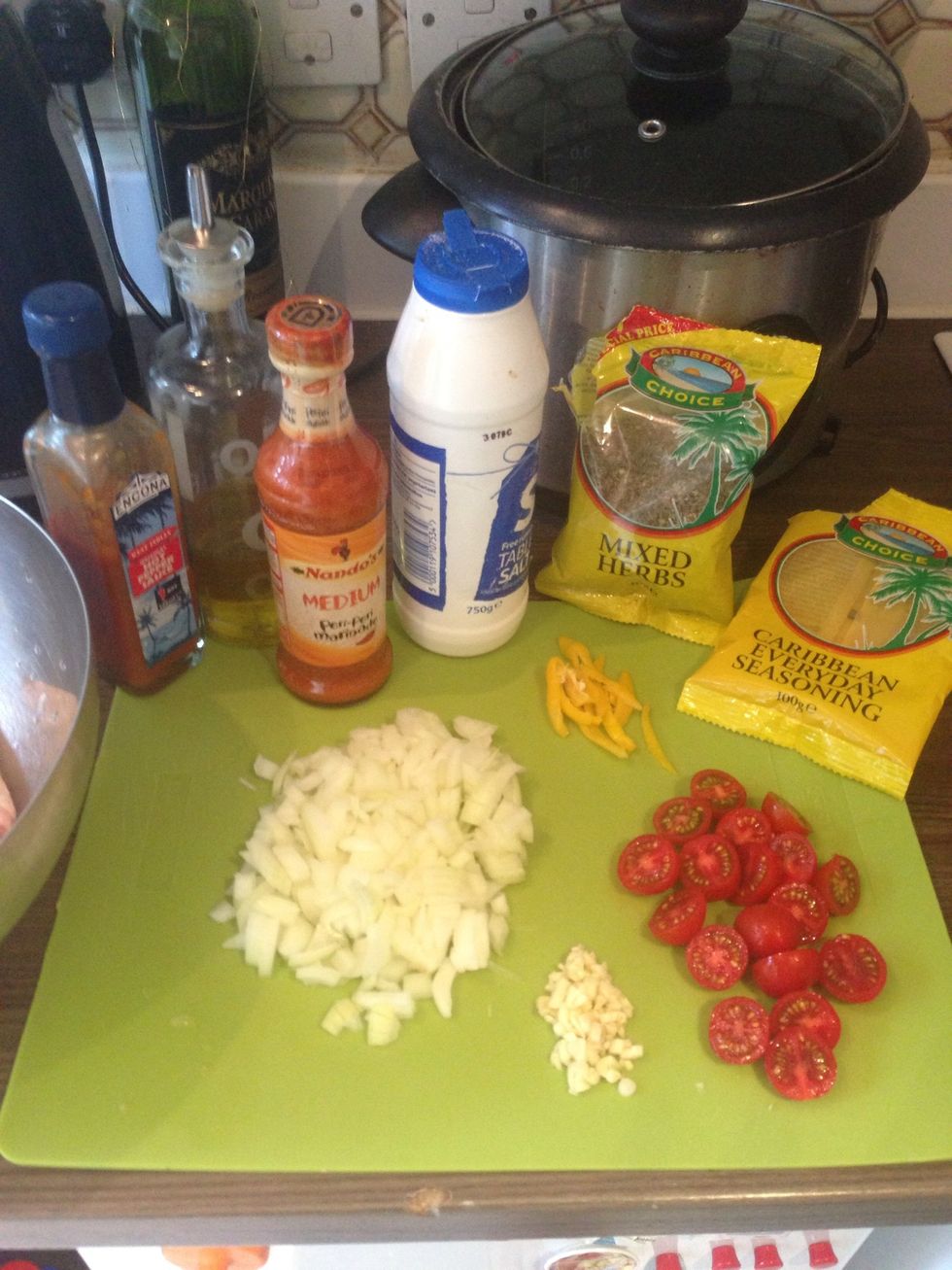 Dice your onion and garlic, chop your tomatoes in half and slice your scotch bonnet pepper \ud83d\ude1c