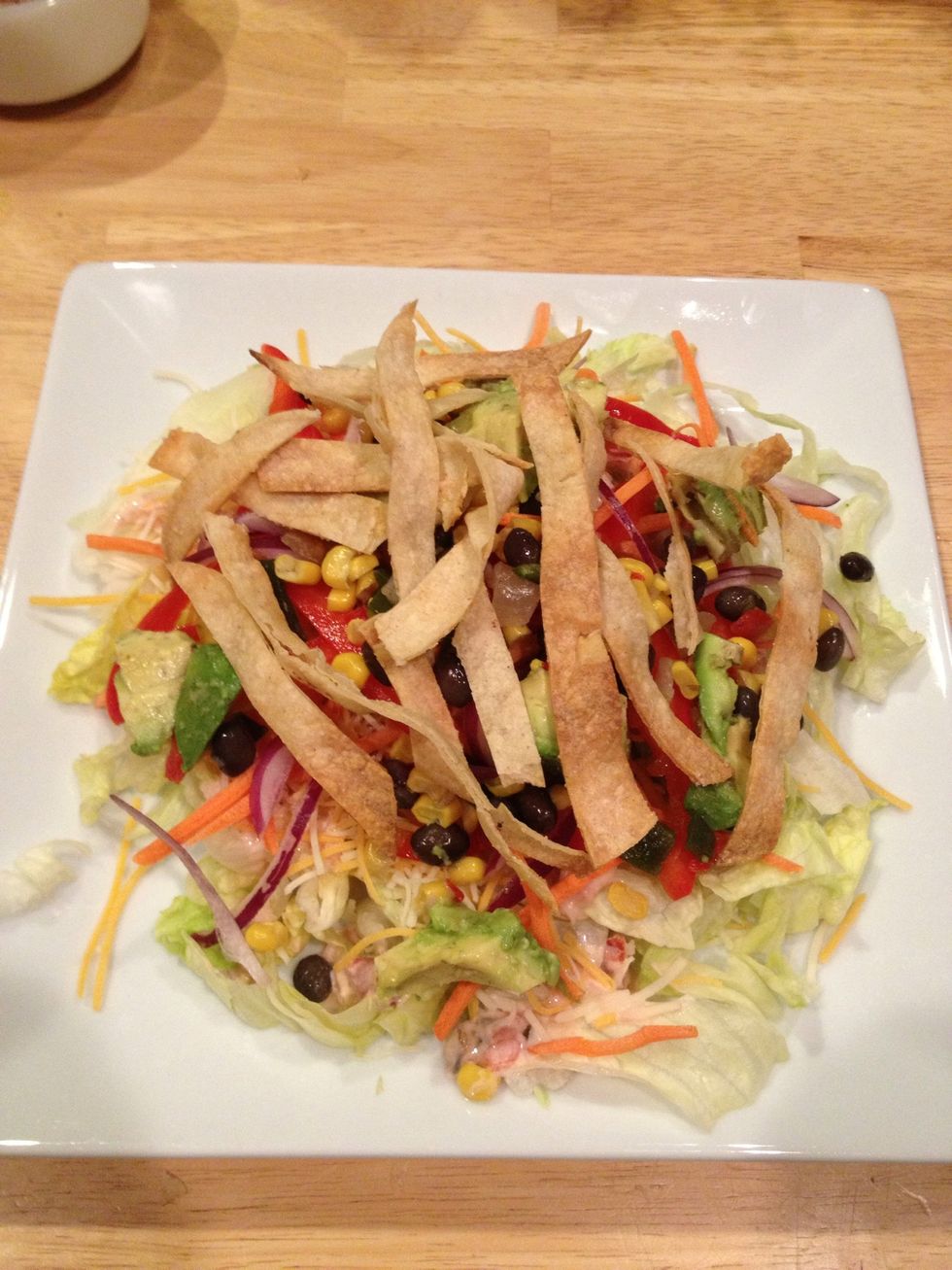 Diced avocado and baked tortilla strips...much healthier than fried.
