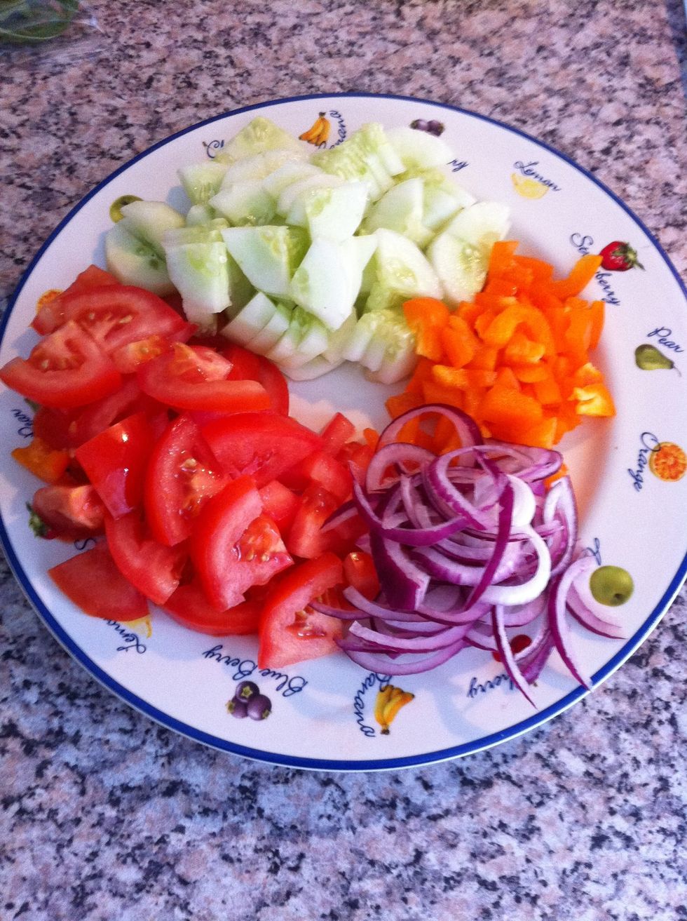 Diced tomatoes, cucumber, bell pepper and sliced onions.