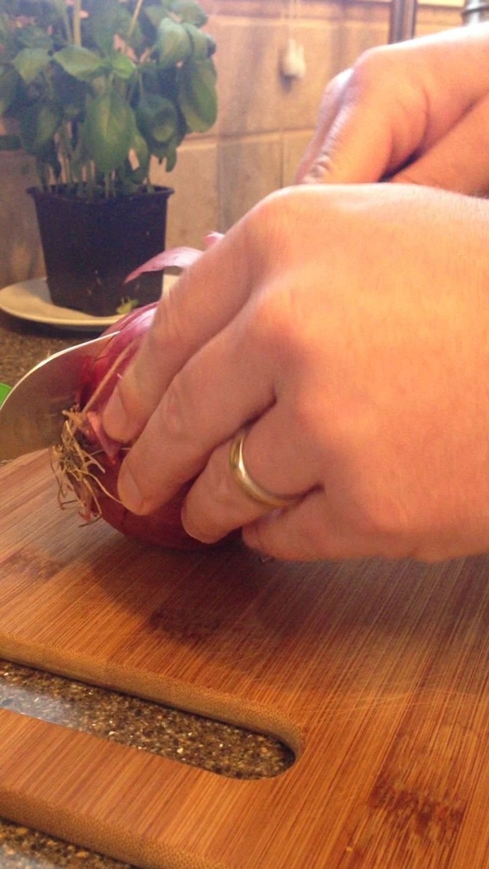 Dicing an onion was something I hated until I learned an easy way.. Slice through the root..