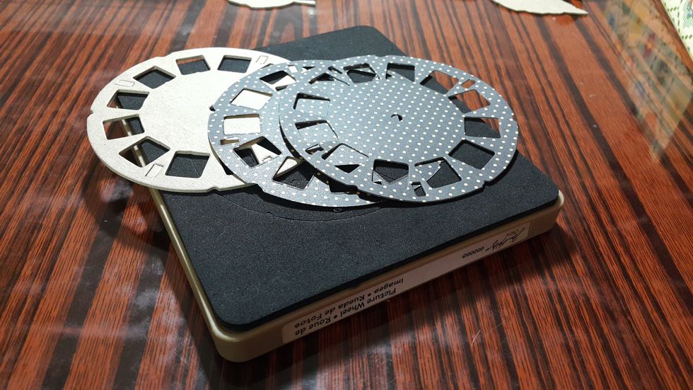 Die cut one piece of chipboard and two pieces of papers for the funny fan