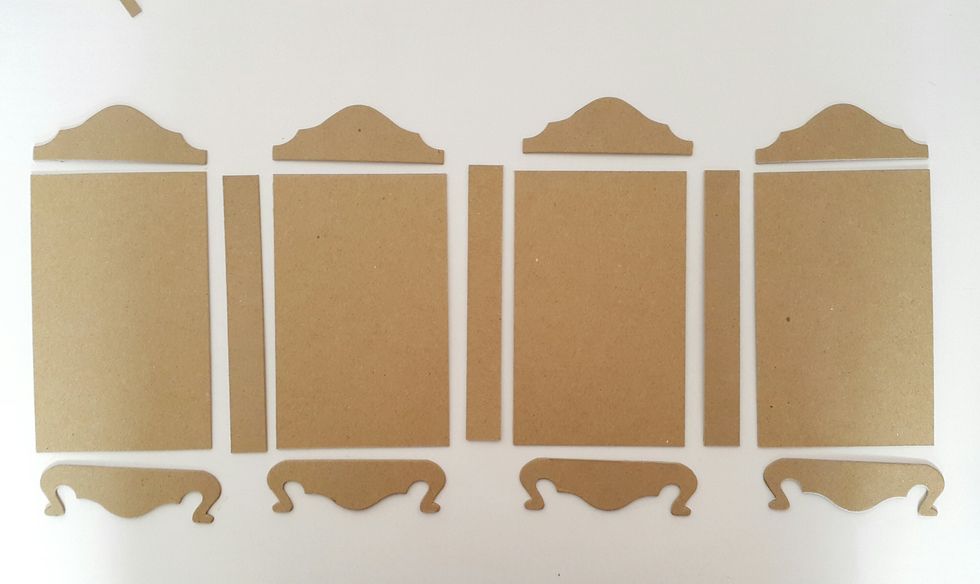 Die cut shapes and panels of 6"x3-3/4" and 6"x3/4" from chipboard