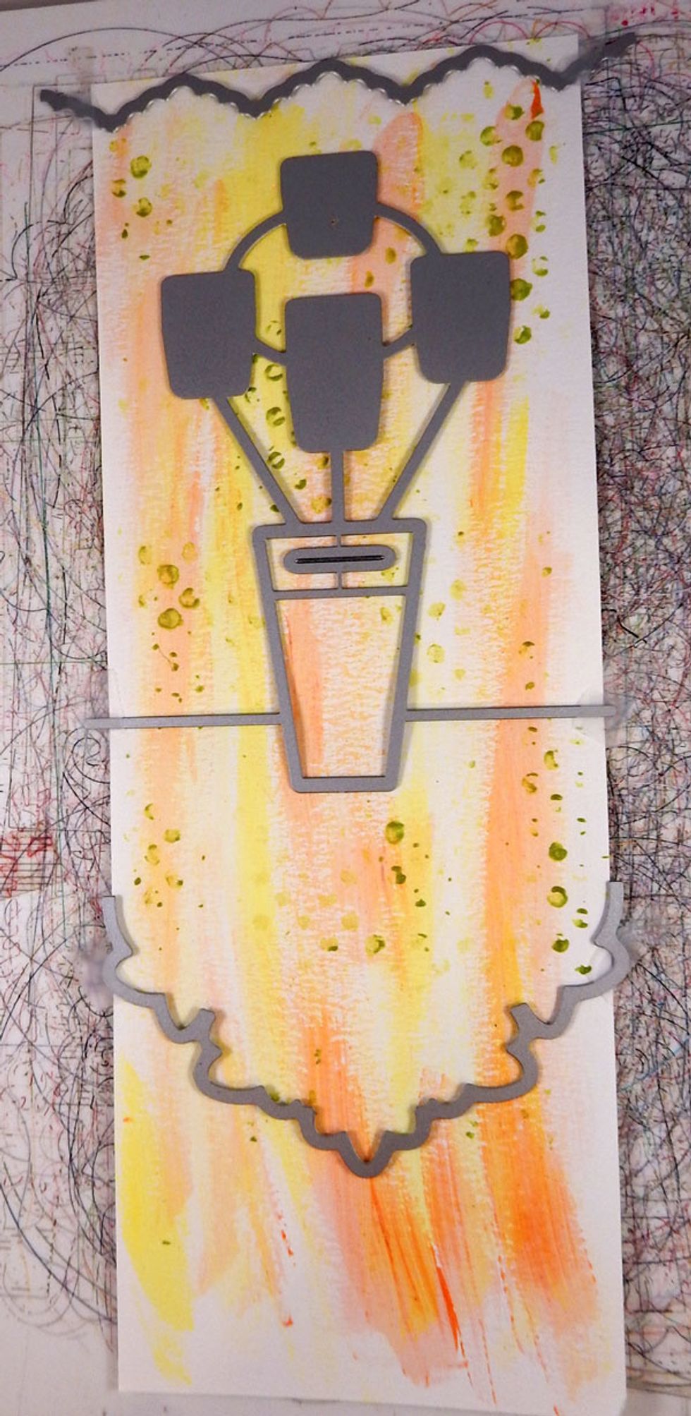 Die cut the 2nd panel in the same fashion as the first.  Use the zig zag die for the top edge with the vase in the center and a doily die for the bottom edge.