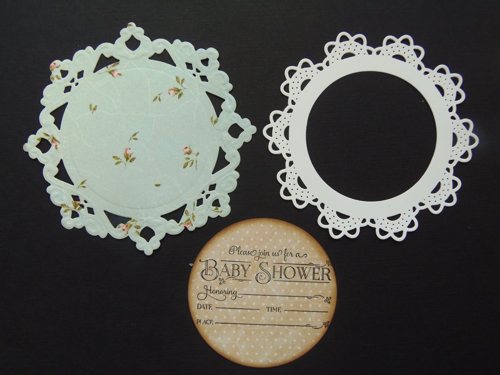 Die cut two different size and color doilies -or use store bought in two different sizes and colors. Cut a big enough circle-with a different paper, where you will stamp the invitation information.