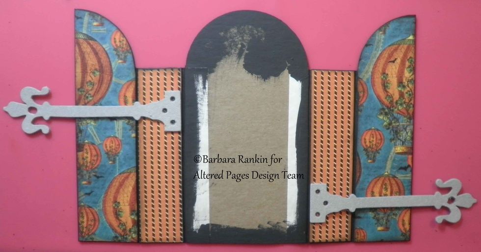 Die cut two hardware hinges from grunge board and mark placement for the holes on the outside of the book cover, as shown.