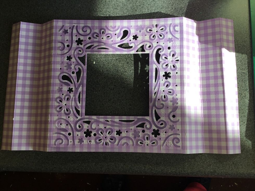 Die cut your chosen card front.  Score one inch and two inches from edge of design. Valley and mountain fold on the score lines.