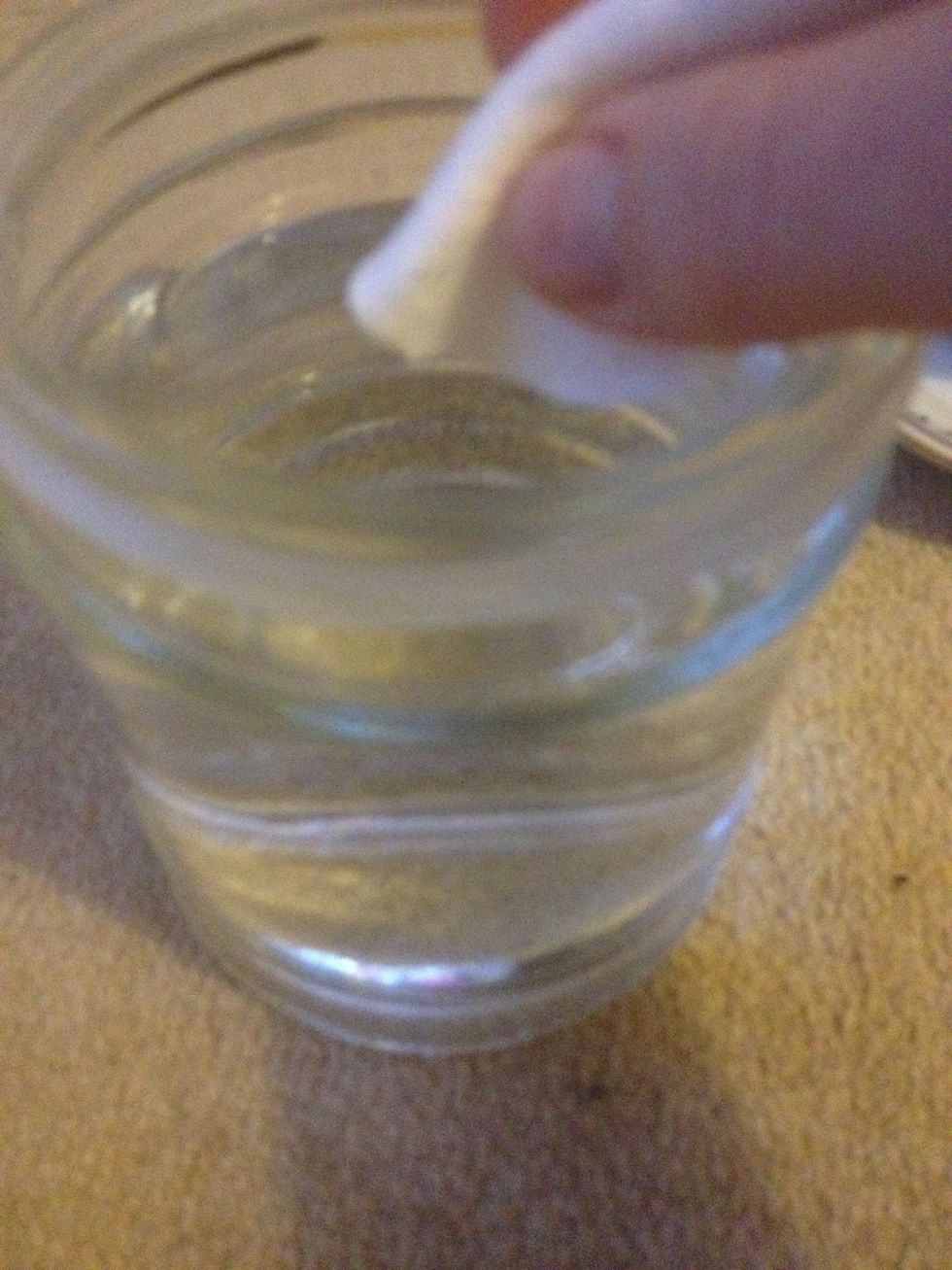 Dip a cotton pad into some water and wipe off the brown scrunge. Do this straight away, it won't hurt to keep it on there. But it also won't take anymore the longer you leave it. So get it off!