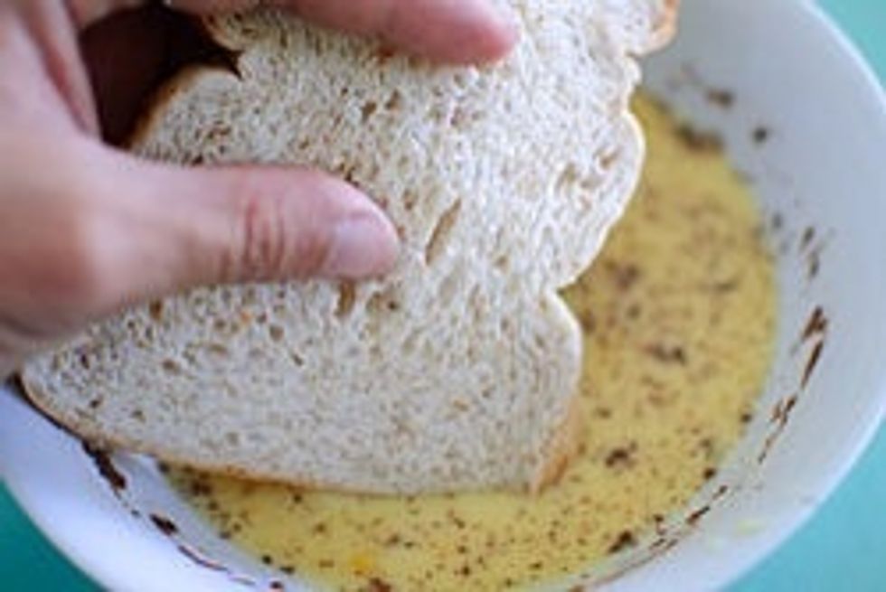 Dip bread into the egg mixture