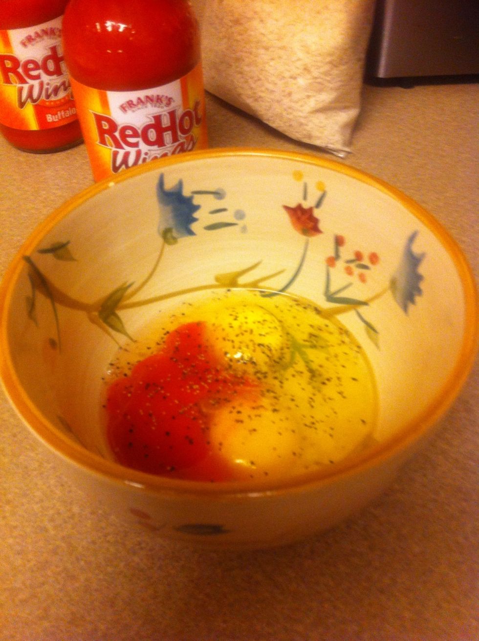Dip chicken in beaten egg mixture