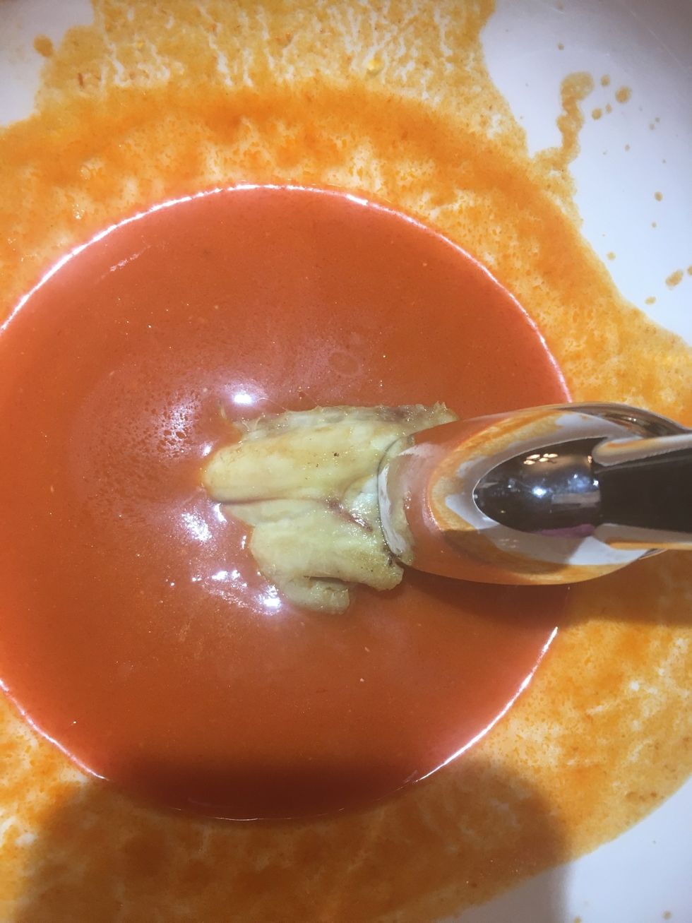 Dip chicken into sauce until fully coated. Let sauce soak for about 3-5 seconds