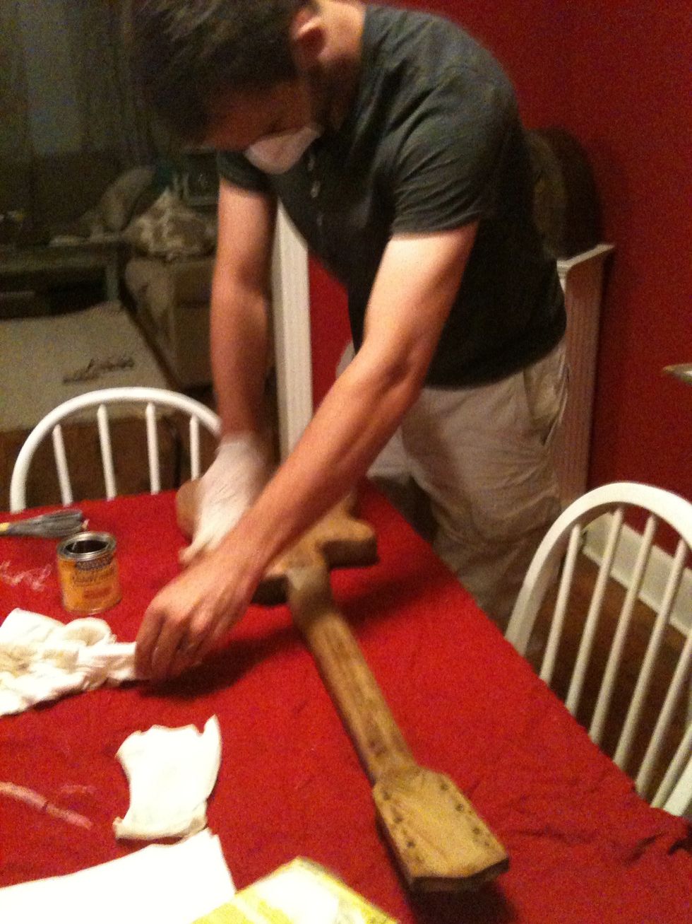 Dip dry cloth in stain. Rub stain along the grain covering all desired areas of guitar. I did about 4 coats of stain over all the desired areas.