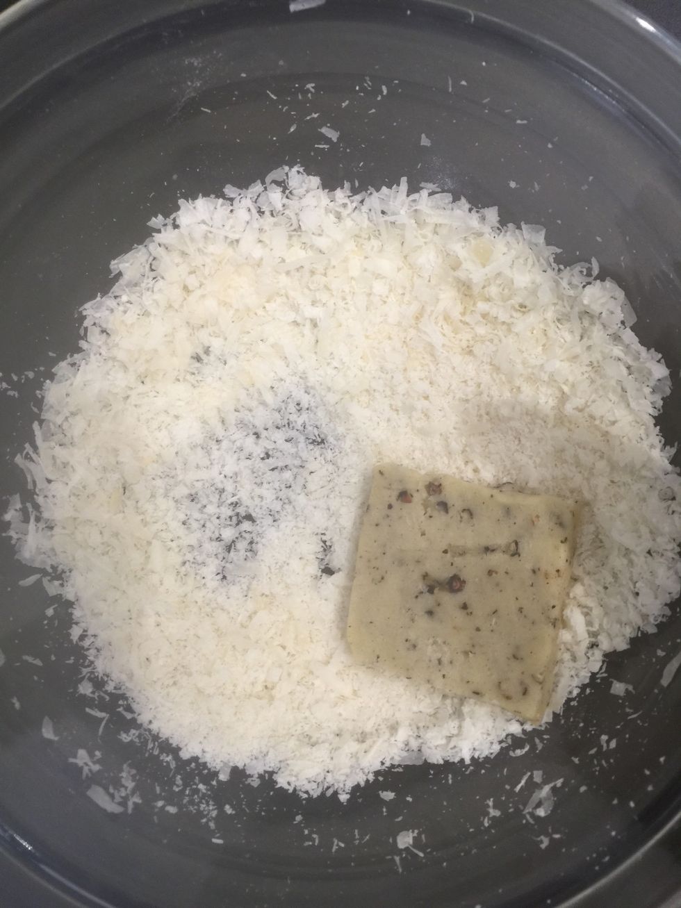 Dip each in the grated Parmesan