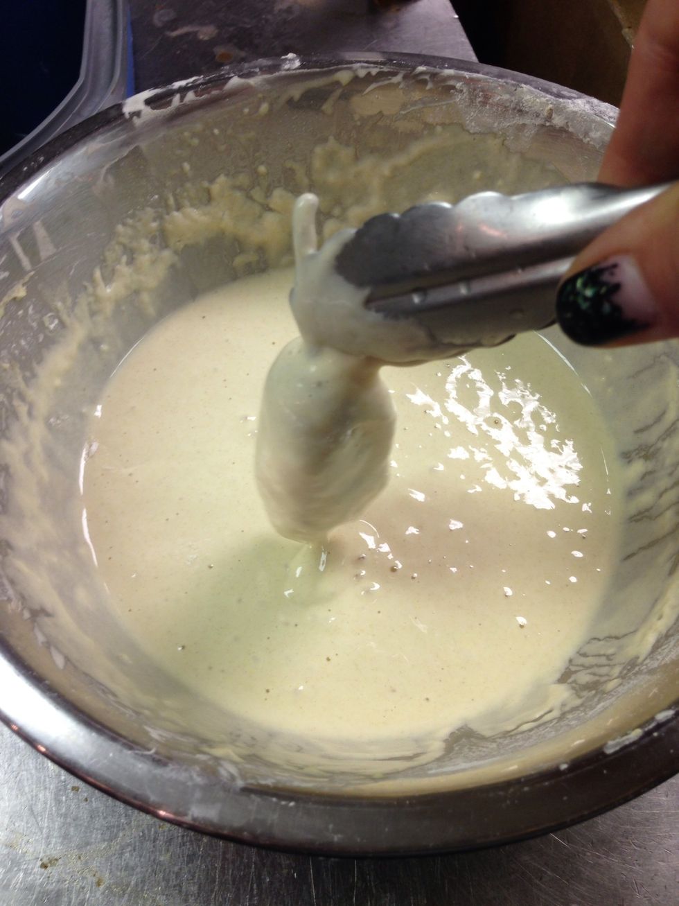 Dip each pepper in the batter .....Before you do this step you need to get a pan and fill it with oil, when the oil is hot do this one by one