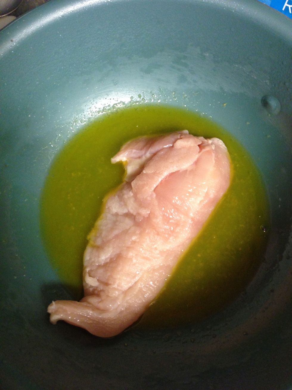 Dip each piece of chicken into melted butter. Cover both sides.