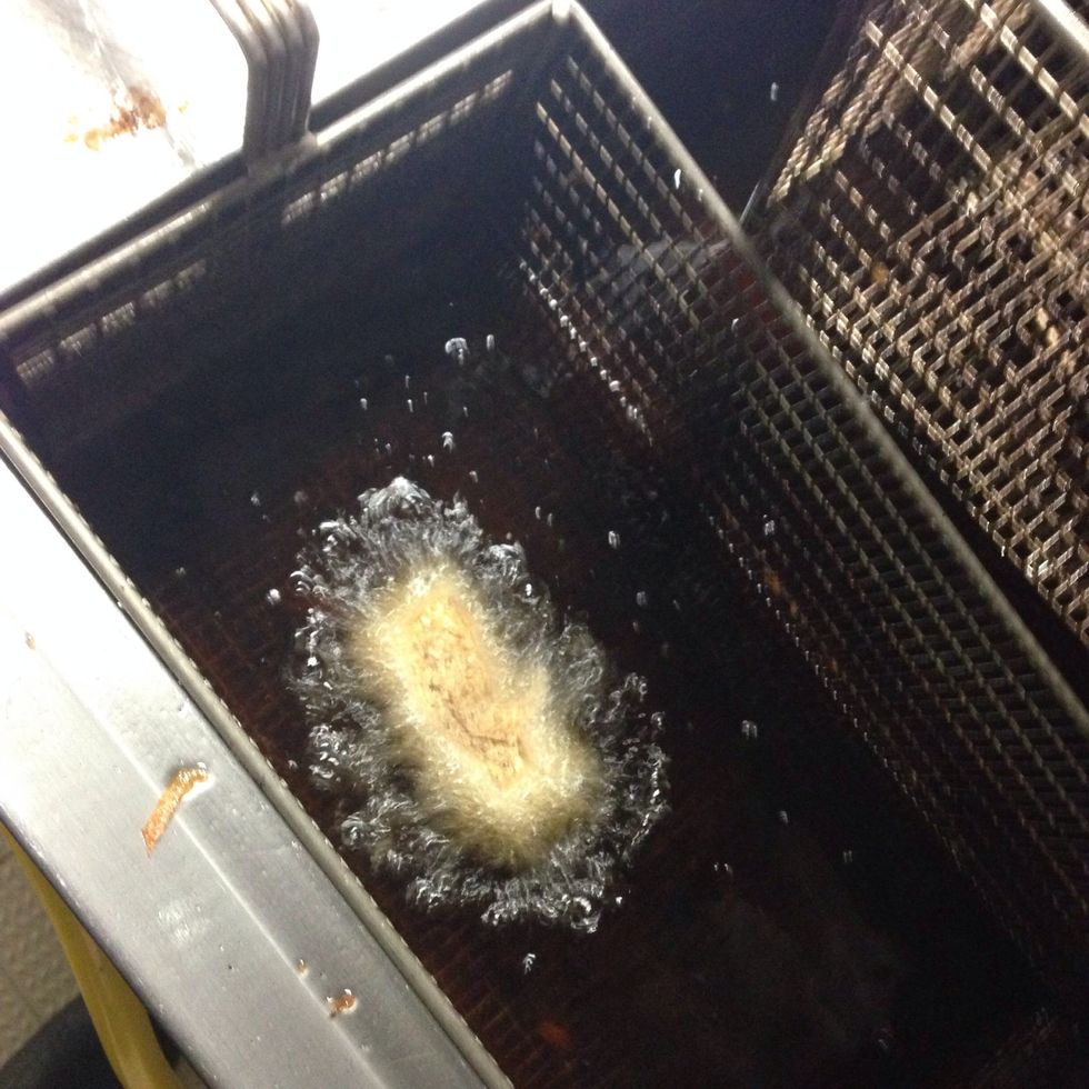 Dip fry them in hot hot hot oil until you get a nice golden-brown color