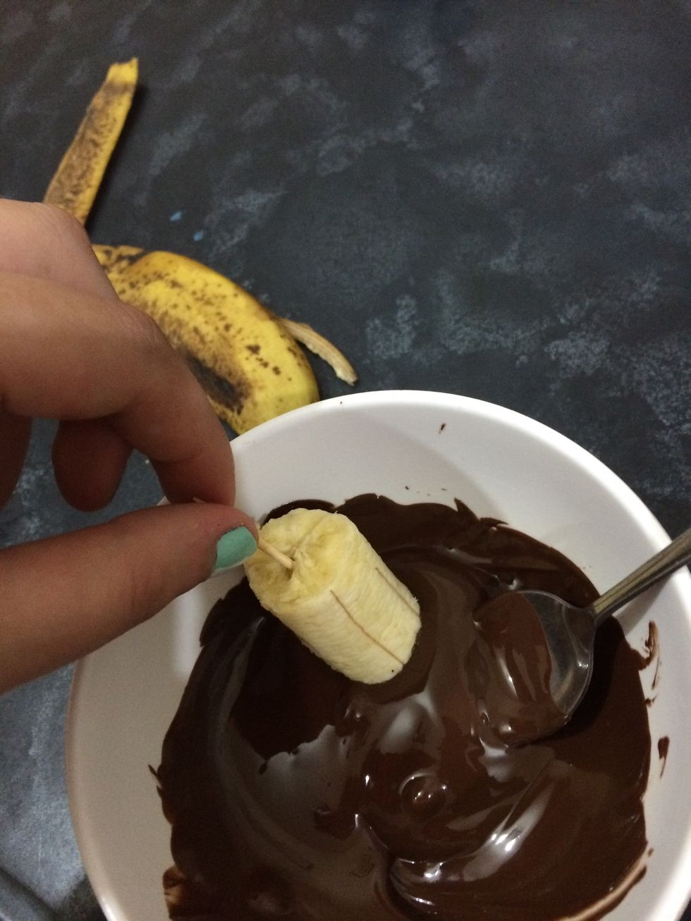 Dip in the chocolate and move around .you can also dip the in sprinkles but I decided to keep it simple