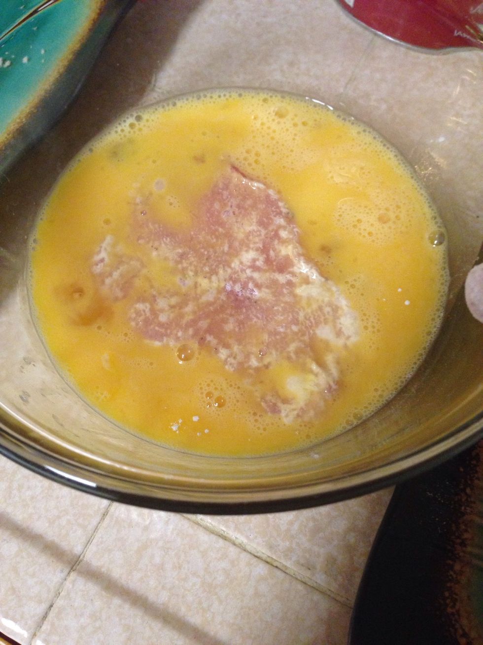 Dip into egg mixture coating both sides