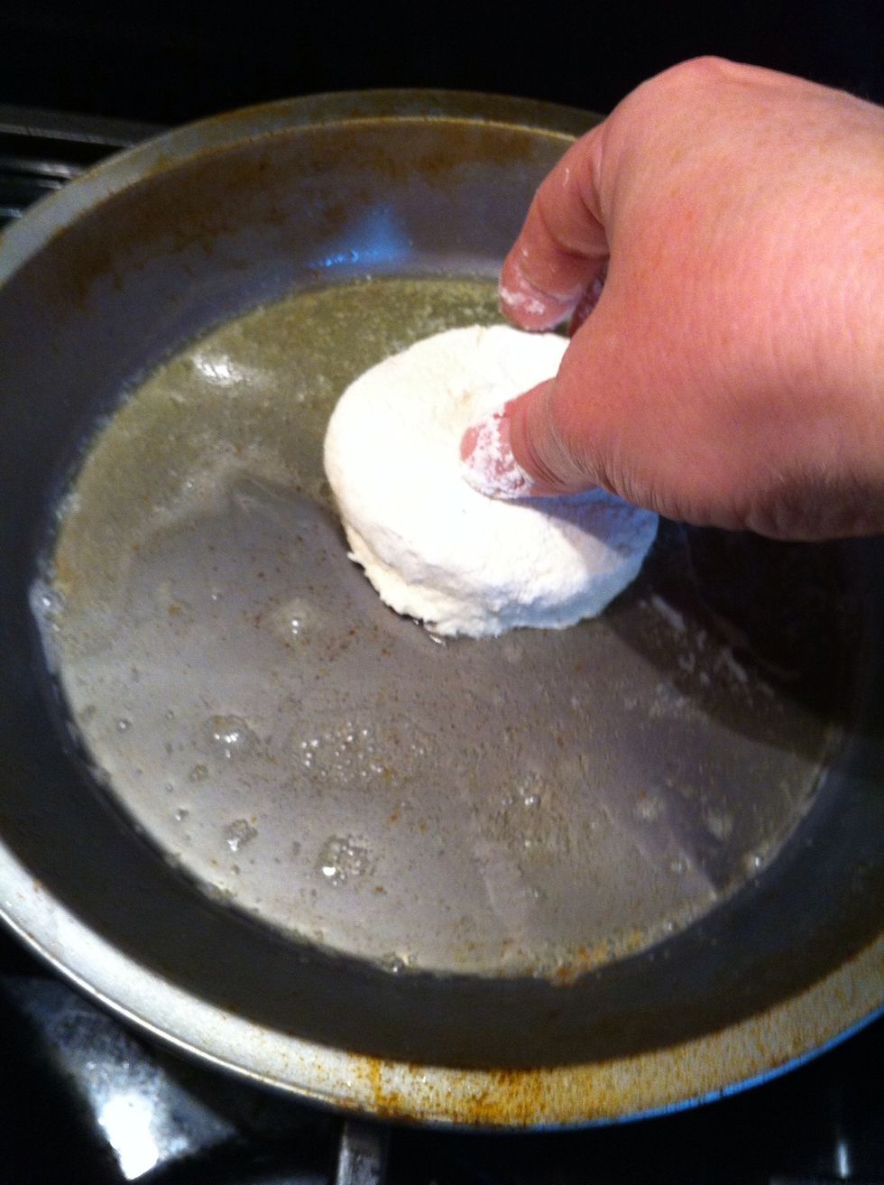 Dip one side in butter.