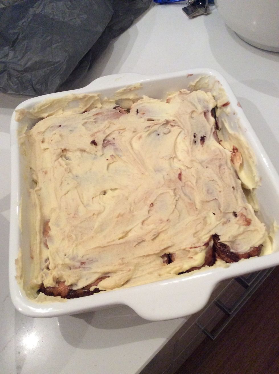 Dip remaining biscuits in cocoa mixture and form another layer on top of the cream. Top with remaining cream and, using thee back of a spoon, smooth the top