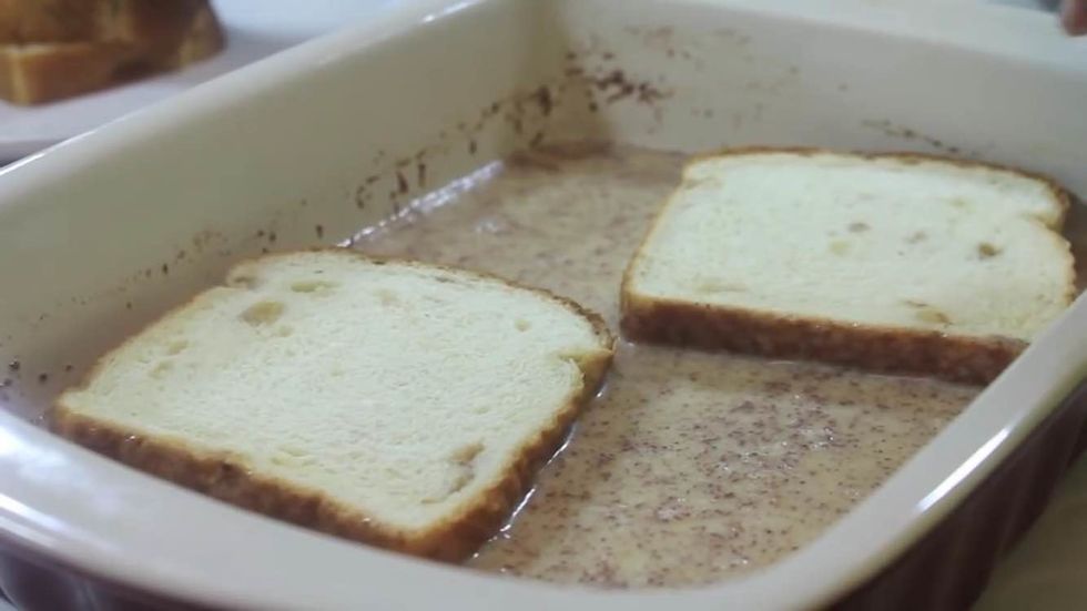 Dip the bread into the egg mixture, coat a slice of the bread with the mixture on both sides.