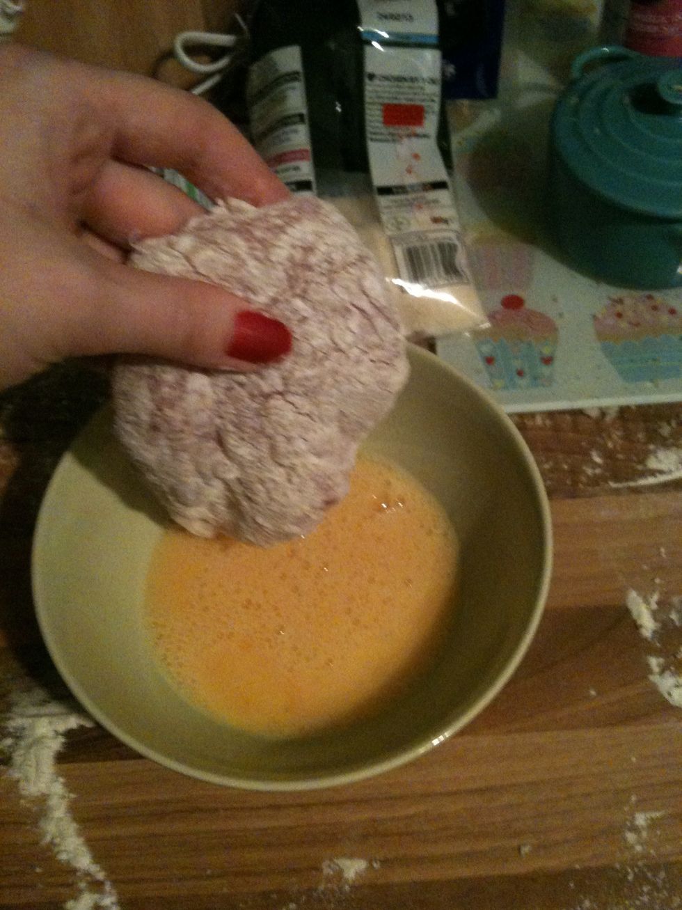 Dip the chicken (one by one) into the egg...