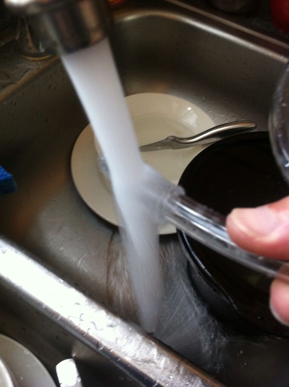 dip the end of your siphon tube in hot water. this will make it easier to get on to the spout of the primary fermenter.