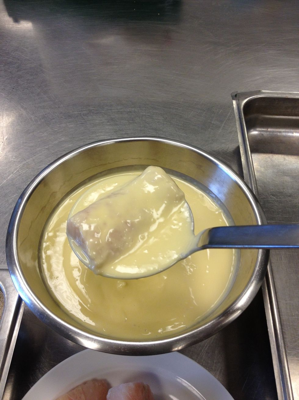 Dip the fish into the liquid margarine and let excess run off.