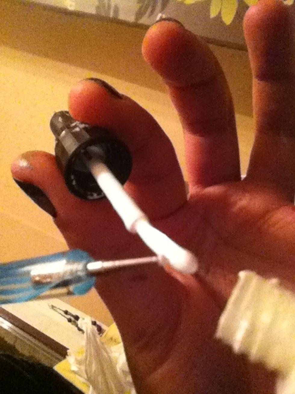 Dip the pin in the nail varnish