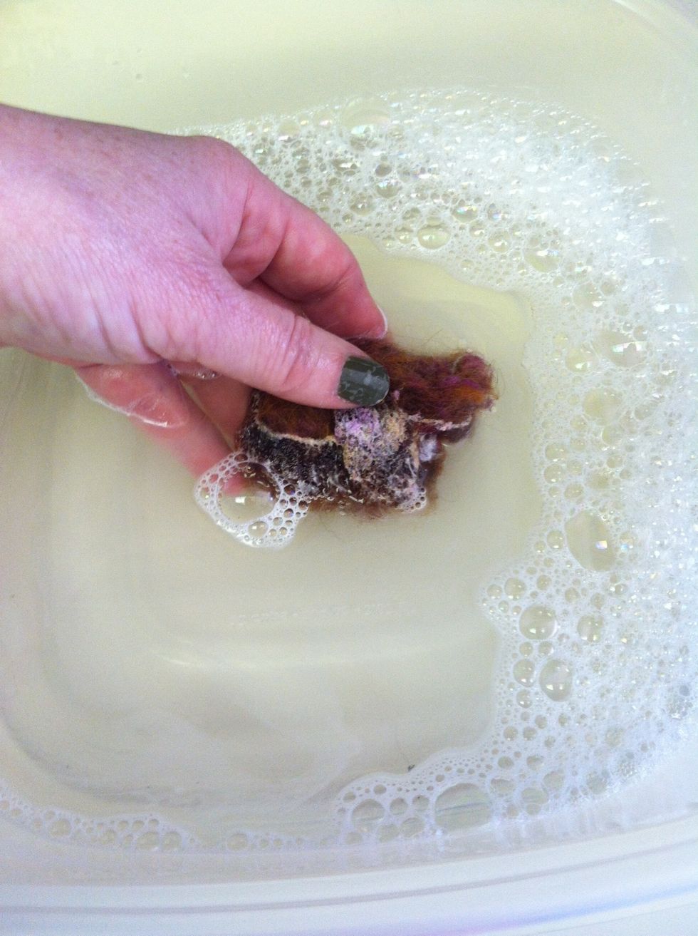 Dip the roving in the water to soak it through.