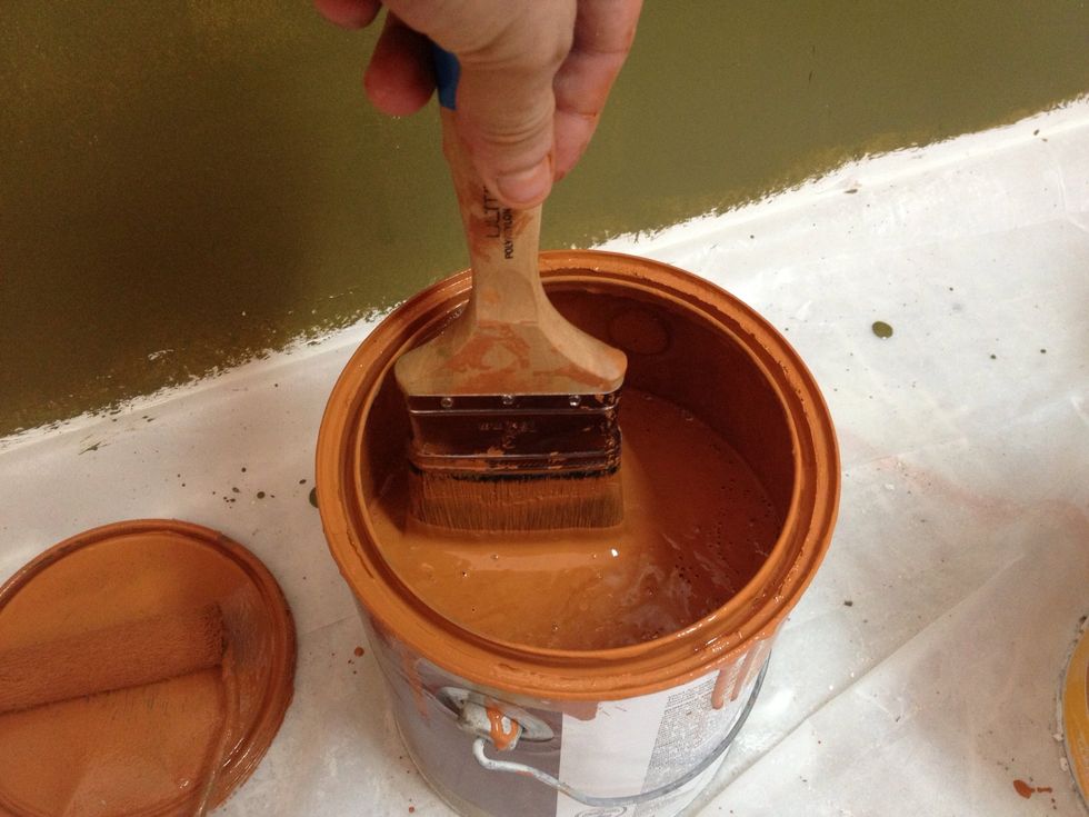 Dip the tip of the brush in the paint.