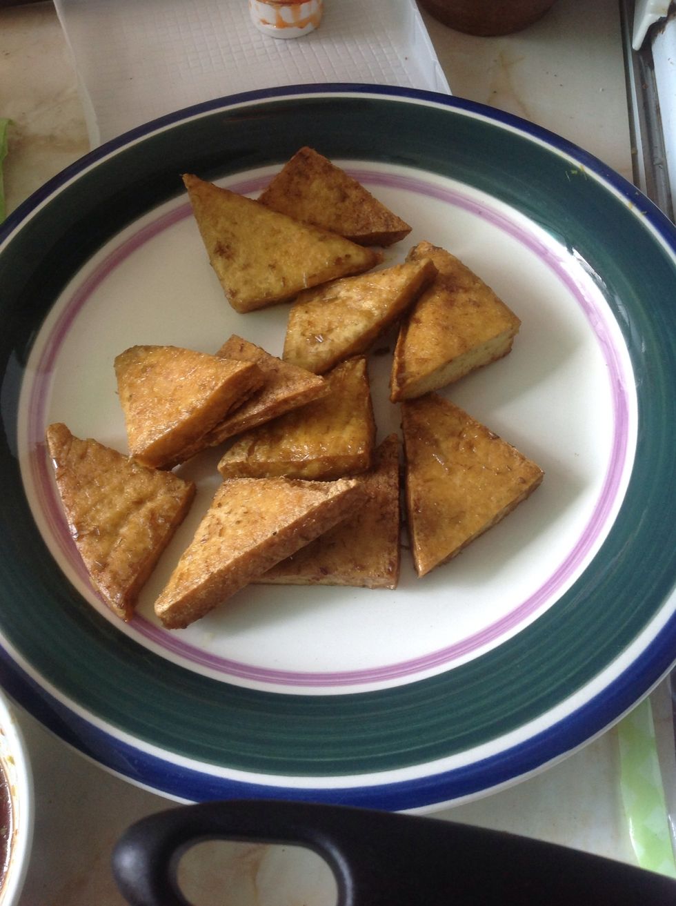 Dip the tofu into a soya sauce bowl. Quick dip!