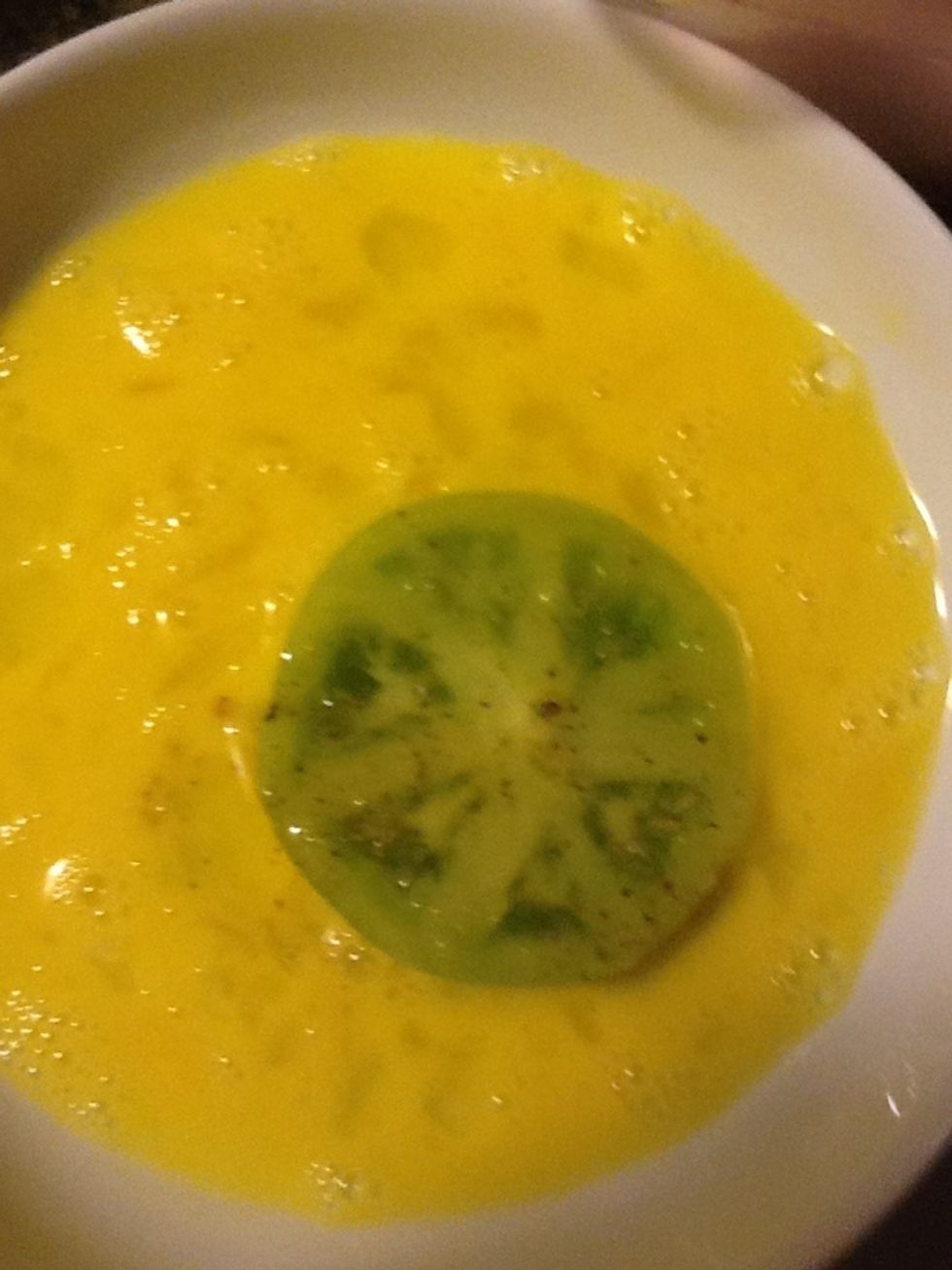 Dip tomato in egg