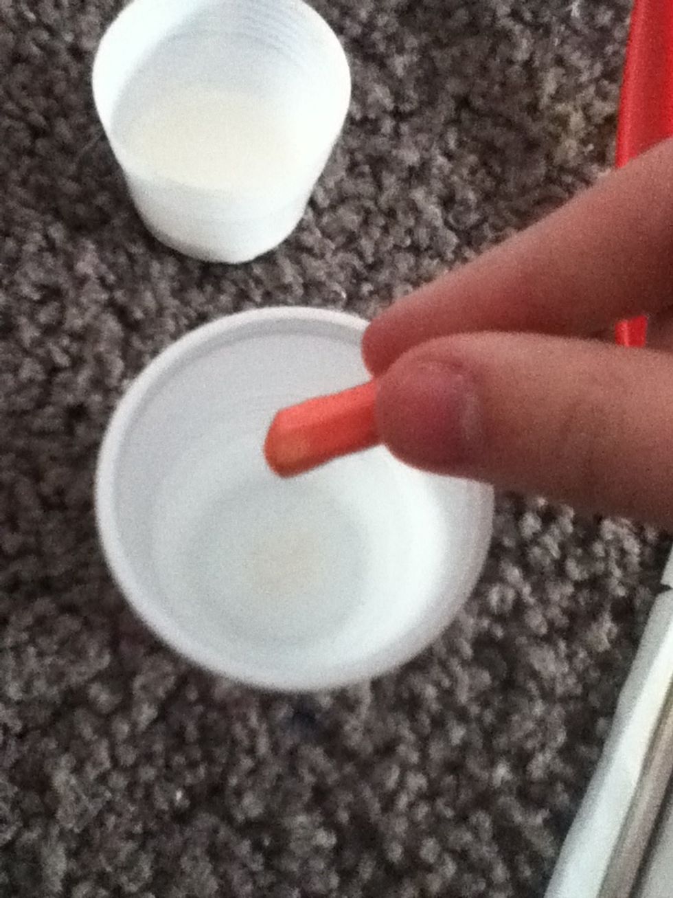 Dip your chalk in water if desired (it helps the chalk become more visible)