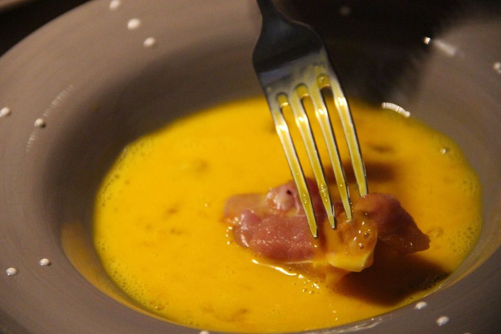 Dip your chicken legs in your beaten egg
