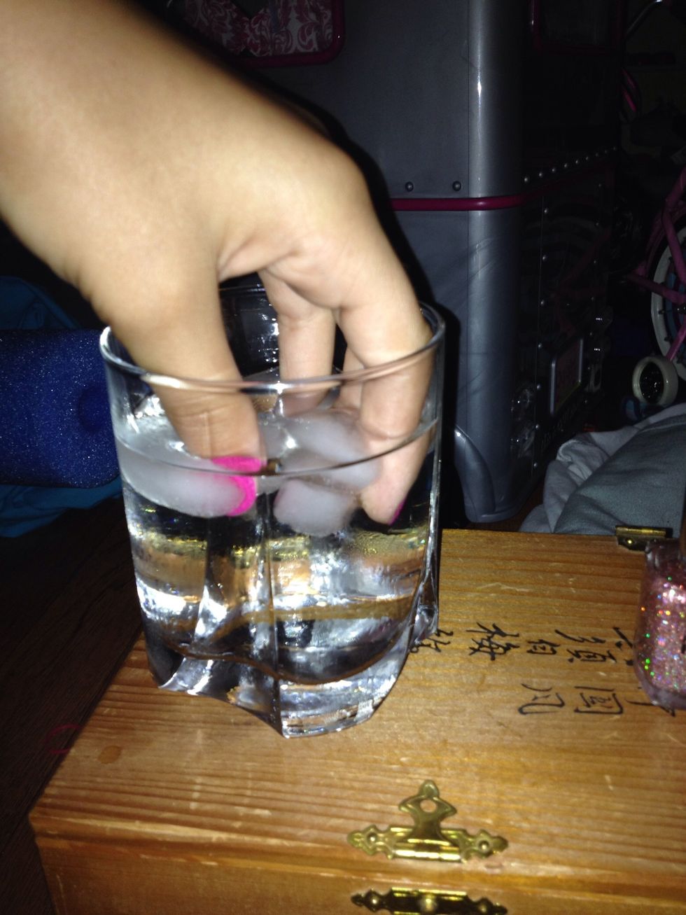 Dip your fingers in the water until your fingers are slightly numb then take them out and dry them with a towel