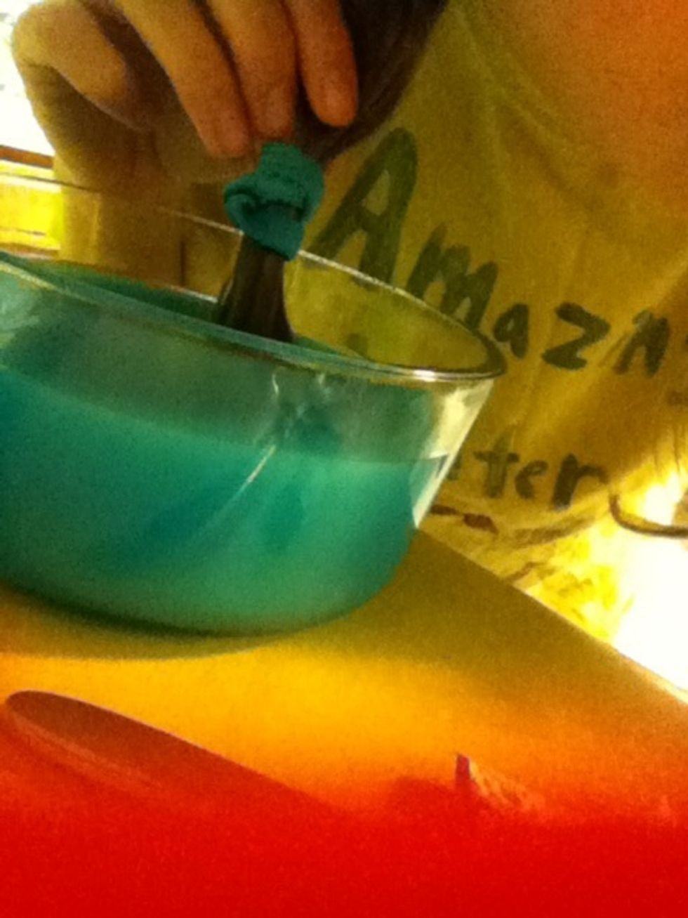 Dip your hair in and leave it for about five minutes. The darker your hair is the longer you may want to leave it in. (Sorry about the red at the bottom; it's my iPod case)